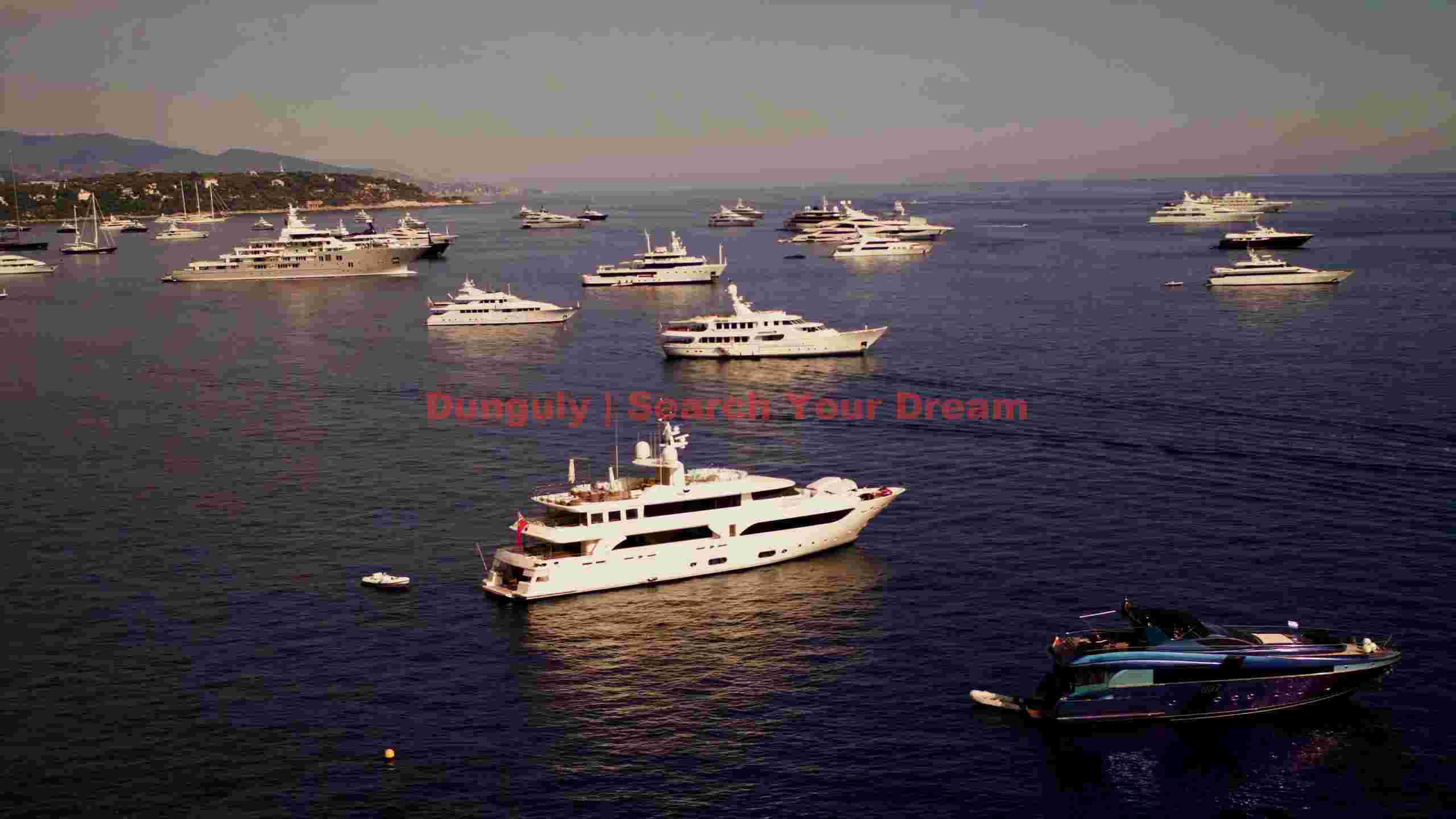 opulent yachts anchored off the mediterranean coast opulent yachts anchored off the mediterranean coast