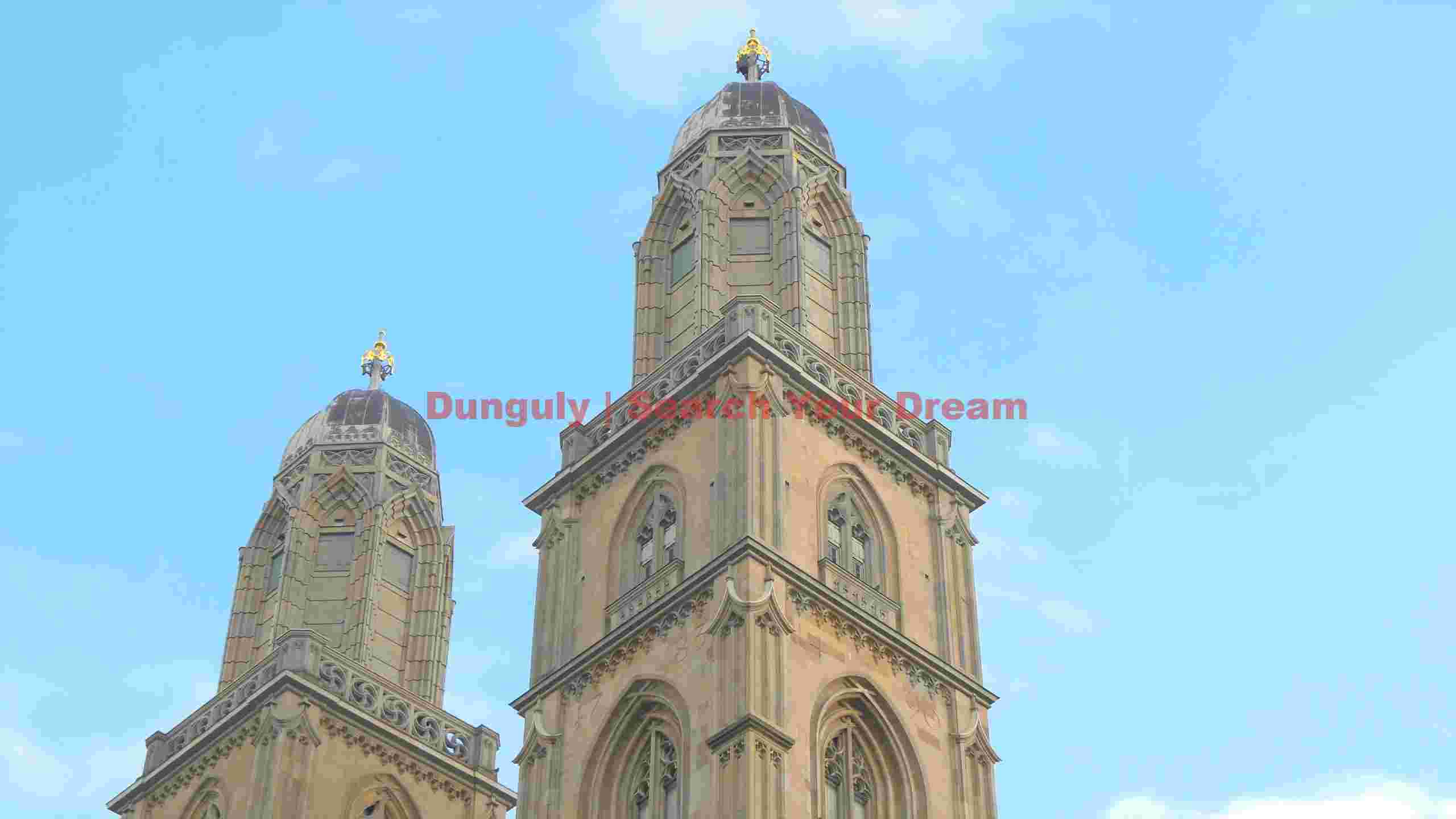 ornate architectural towers against blue sky ornate architectural towers against blue sky