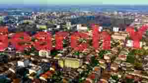 At Home panoramic aerial cityscape with forest