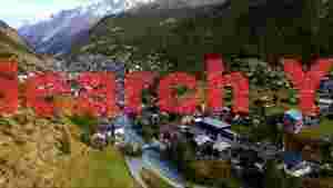 At Home panoramic alpine village in mountain valley