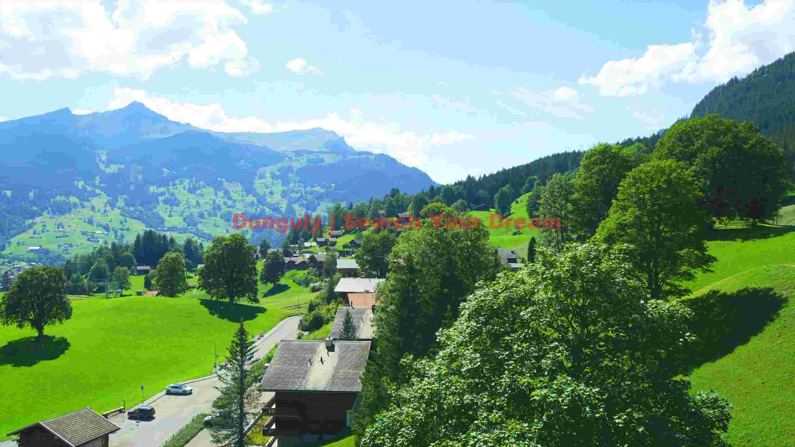 panoramic alpine village in verdant valley panoramic alpine village in verdant valley