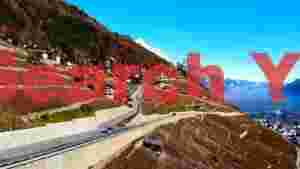 panoramic alpine vineyard village and valley