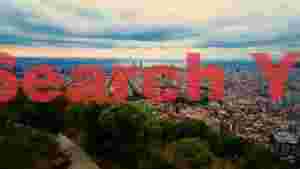 panoramic barcelona city to sea at dawn