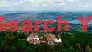 At Home panoramic city and lake view from mountain peak