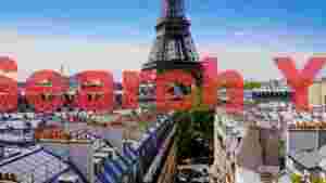 panoramic parisian rooftops with eiffel tower