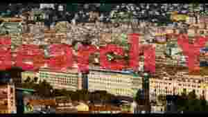 At Home panoramic rooftop view of a bustling european city