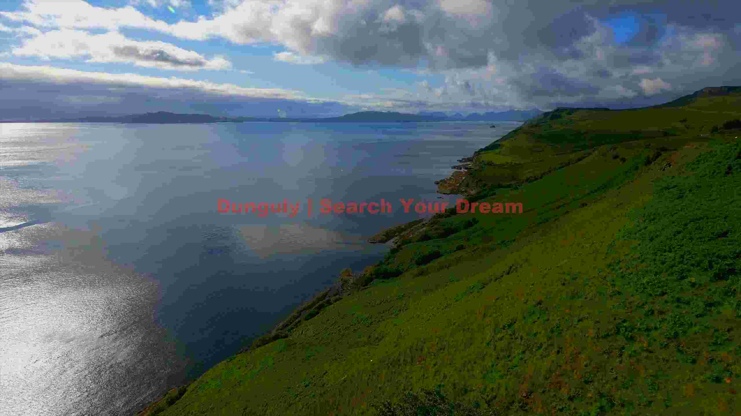 panoramic scottish coastline with shimmering sea panoramic scottish coastline with shimmering sea