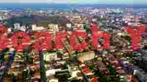 At Home panoramic urban rooftops
