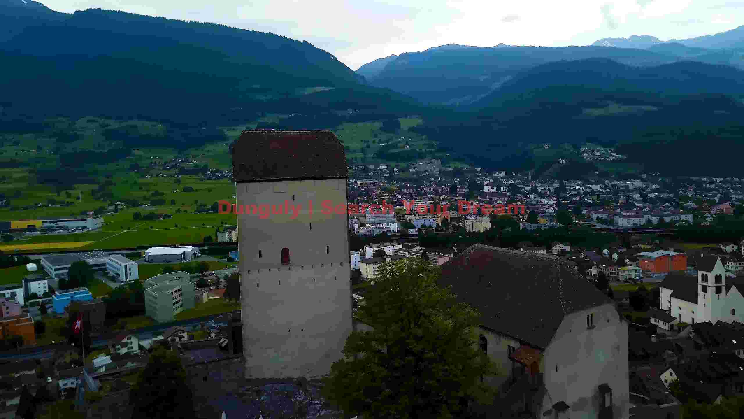 panoramic view of historic alpine valley town panoramic view of historic alpine valley town