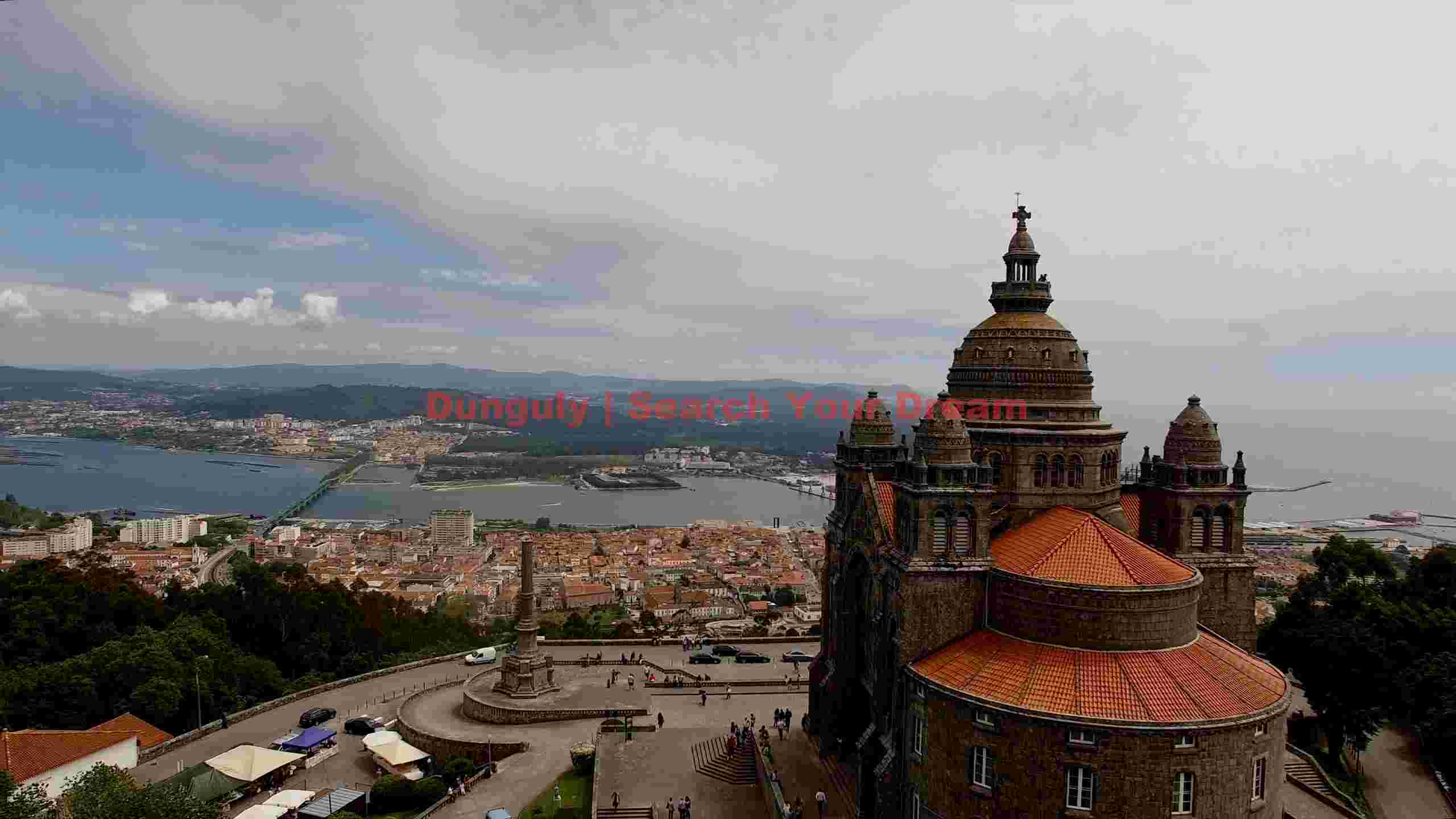 panoramic vista of sacred heights and coastal city panoramic vista of sacred heights and coastal city