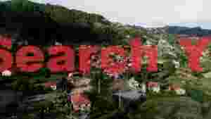 At Home portuguese hillside village amidst lush mountains
