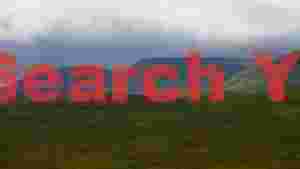 rolling green hills and distant peaks