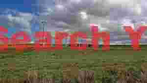 rolling hills wind farm under dynamic skies