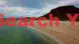 rugged coastline under dramatic skies
