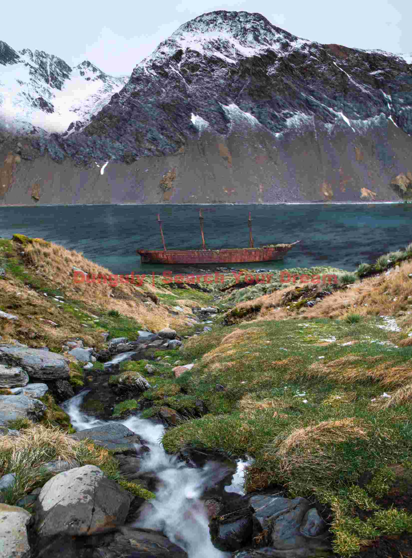 rusting relic in a frozen fjord rusting relic in a frozen fjord