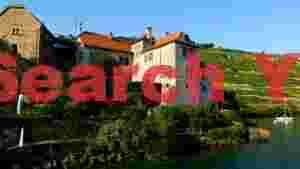 At Home scenic swiss lakeside chyteau and vineyard terraces