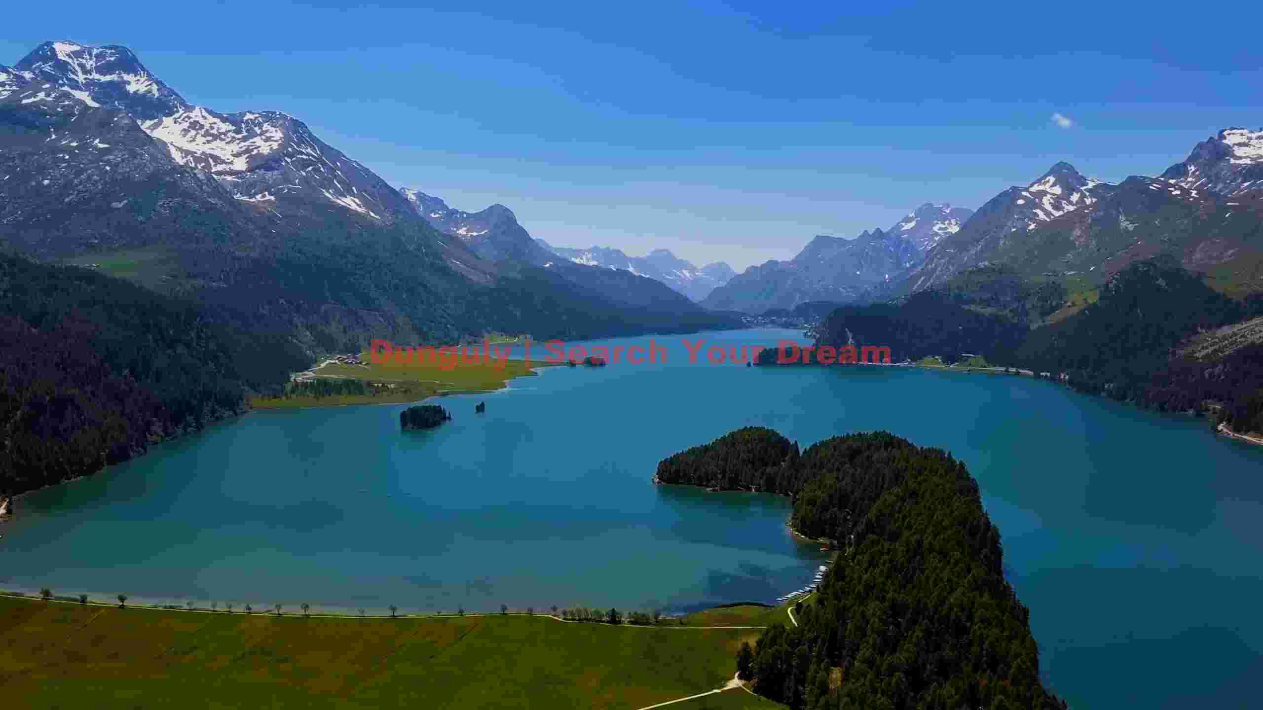serene alpine lake amidst majestic mountains serene alpine lake amidst majestic mountains