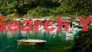 serene boathouse village of ine bay