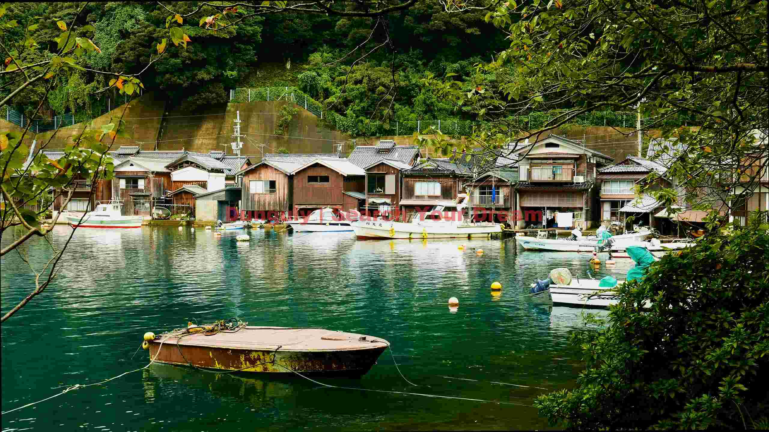 serene boathouse village of ine bay serene boathouse village of ine bay