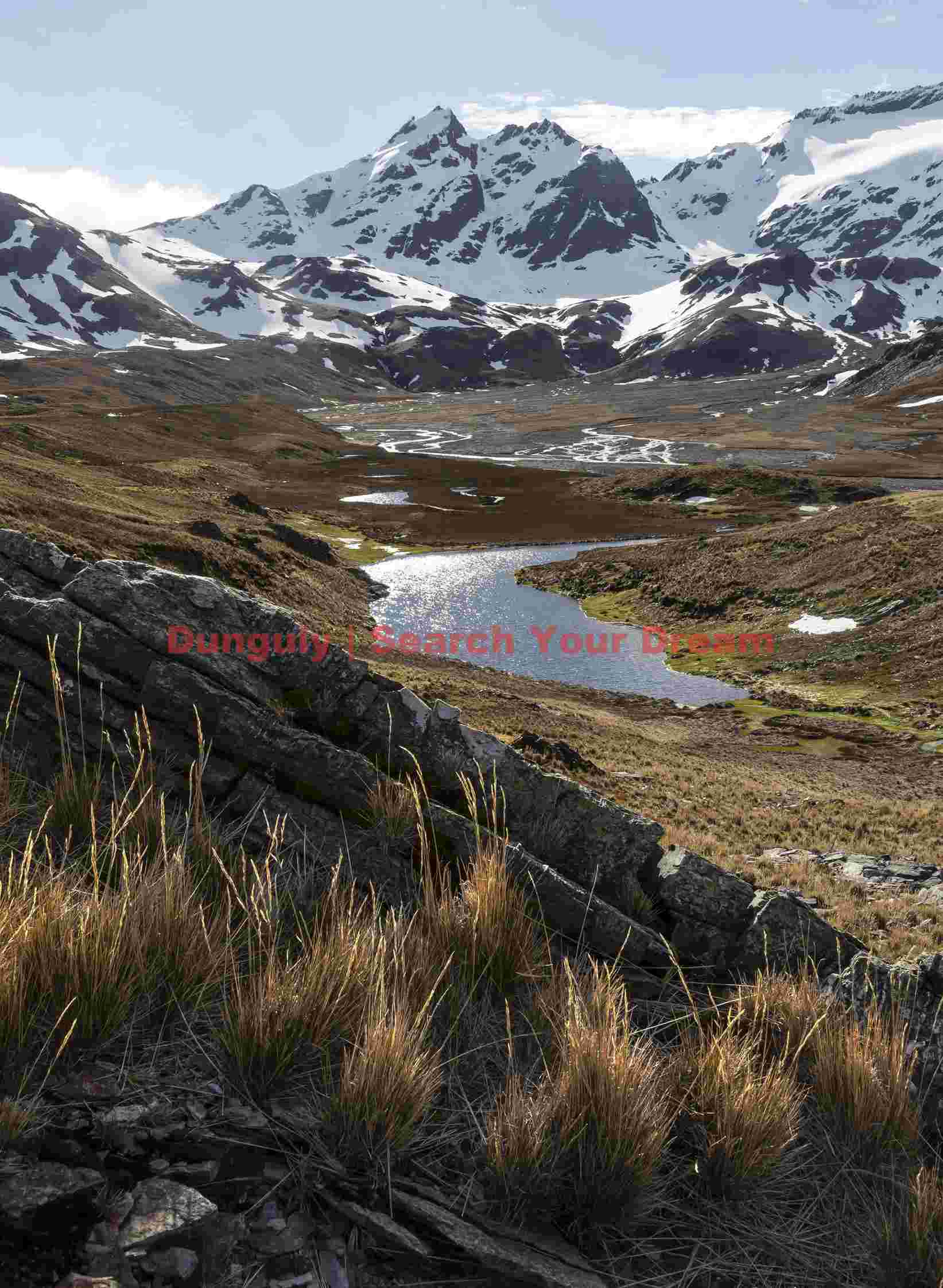 serene glacial valley with snow capped peaks serene glacial valley with snow capped peaks