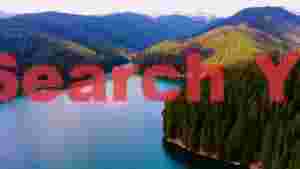 serene mountain lake and evergreen forests