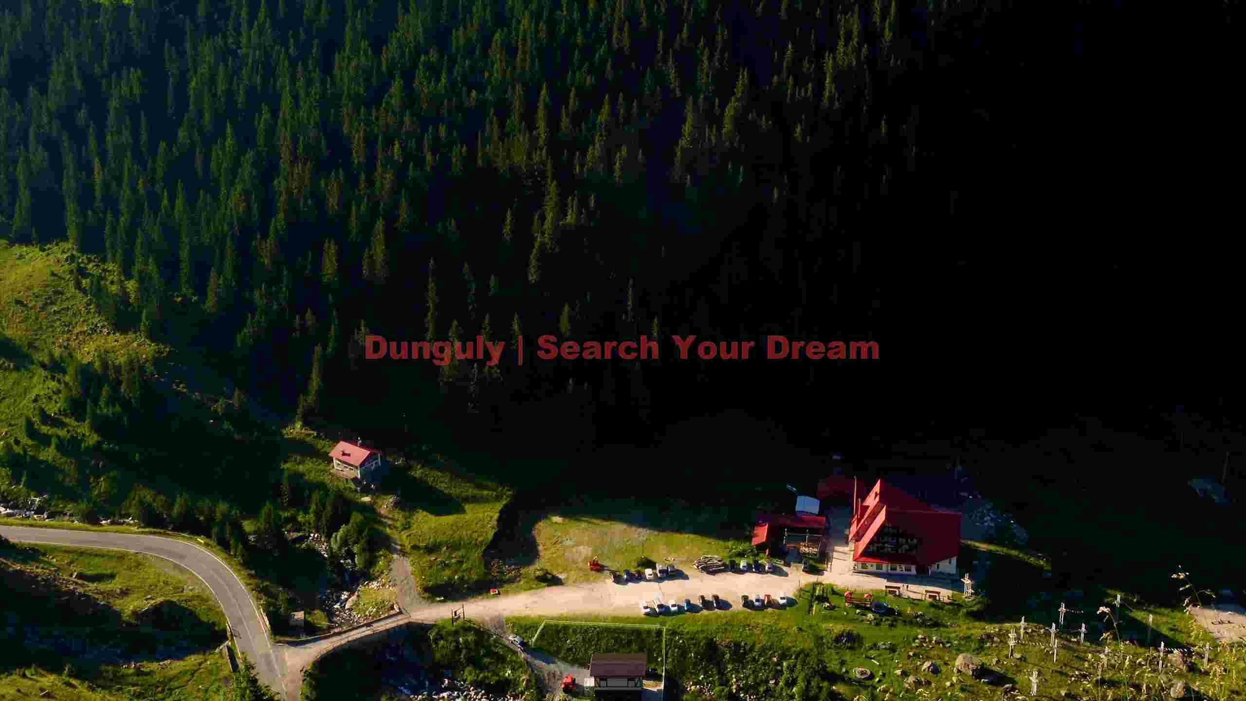 serene mountain valley with forest and lodges serene mountain valley with forest and lodges