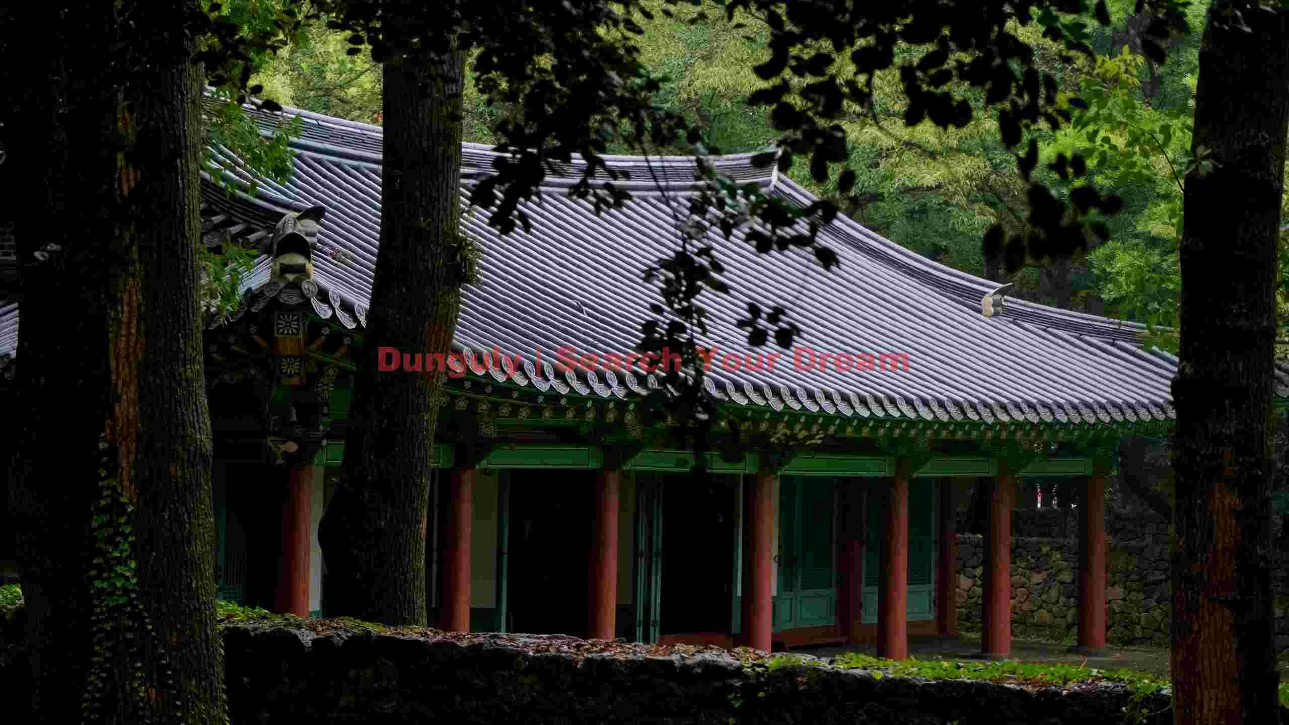serene traditional korean temple in verdant forest serene traditional korean temple in verdant forest