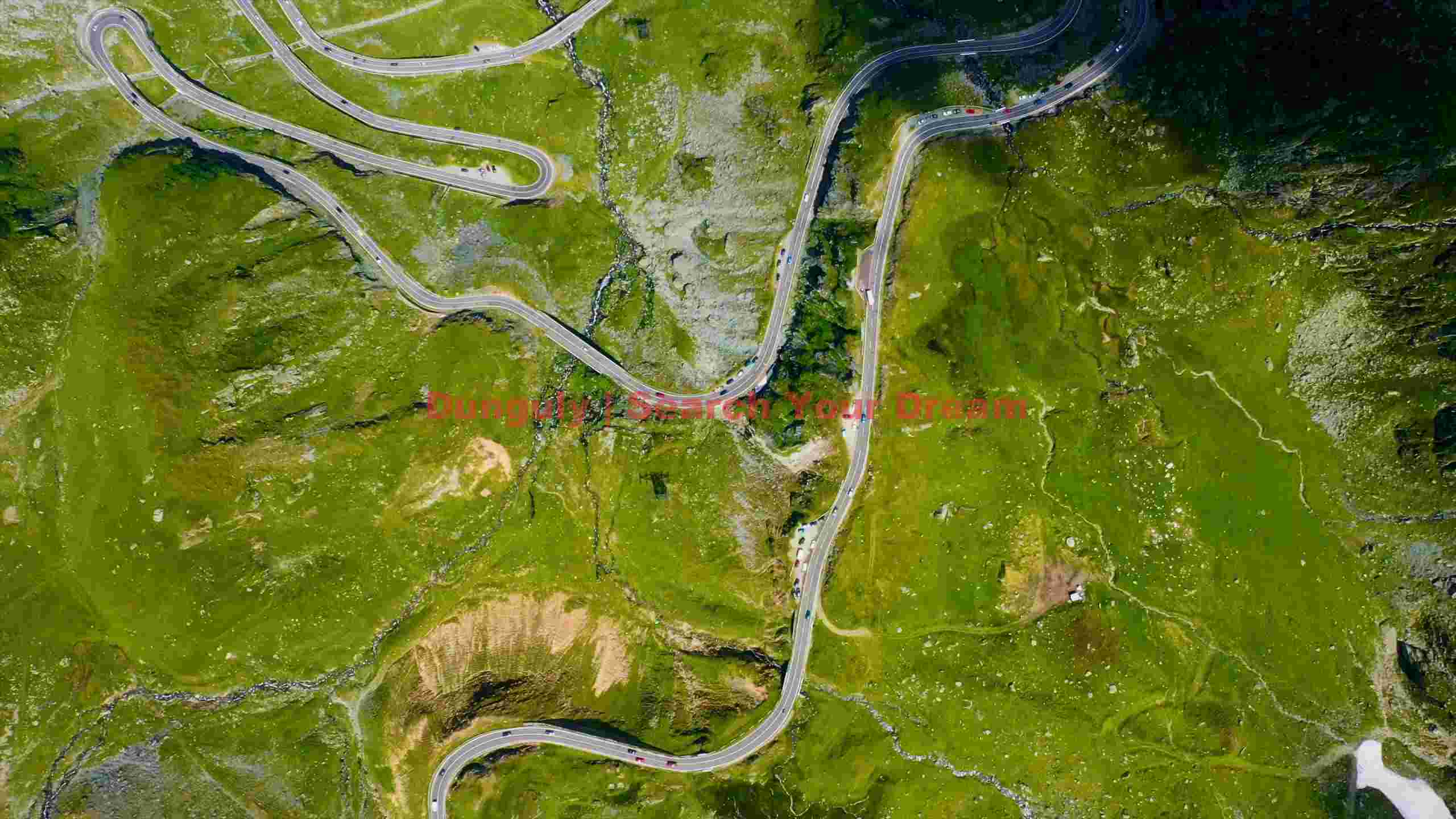 serpentine mountain pass aerial view serpentine mountain pass aerial view