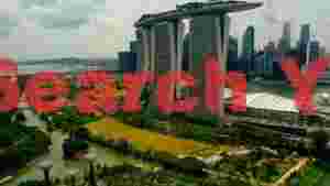 At Home singapores iconic marina bay sands and gardens by the bay aerial view