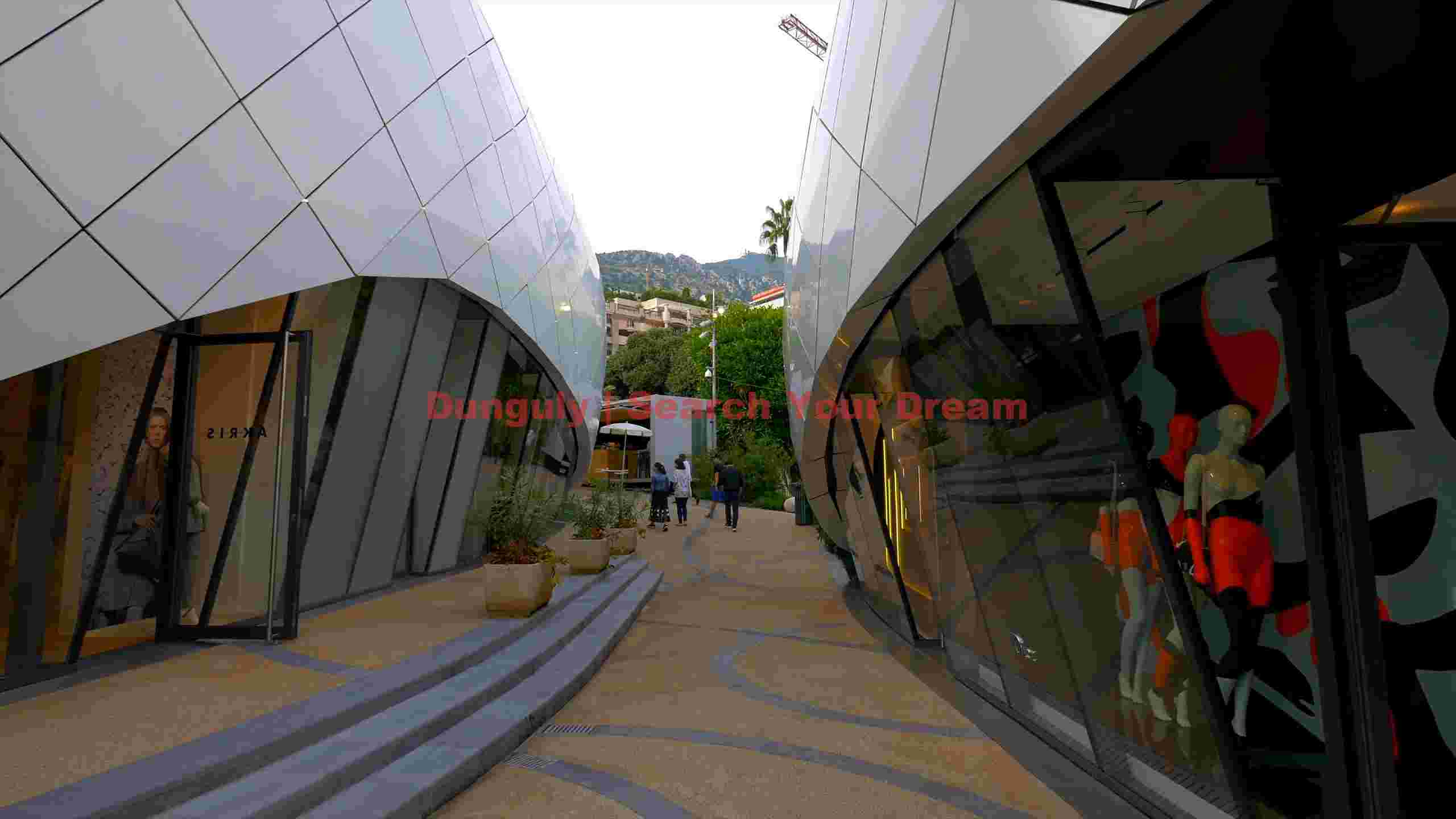 sleek modern promenade with luxury boutiques sleek modern promenade with luxury boutiques