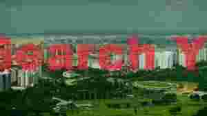 At Home sprawling city greenscape panorama