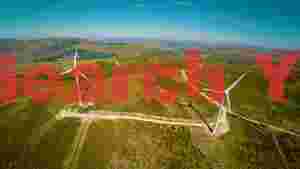 sustainable wind farm on verdant hills