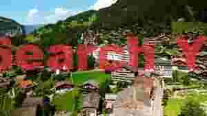 swiss alpine village in lush valley