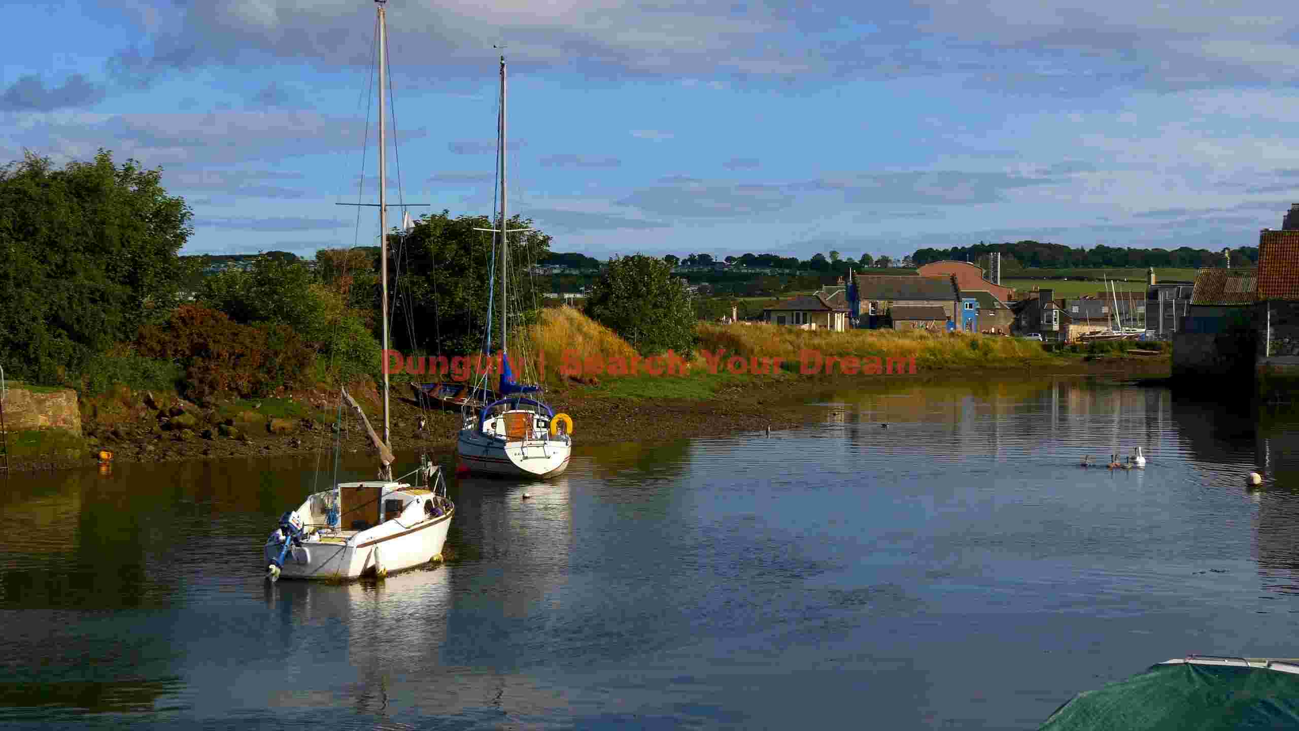 tranquil sailboat harbor on a clear day tranquil sailboat harbor on a clear day