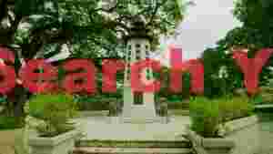 tranquil white pagoda tower in green park