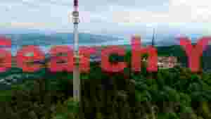 At Home uetliberg panorama lake zurich and forested peaks