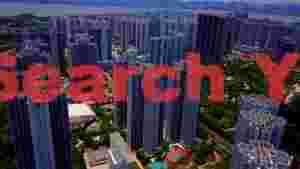 vast urban cityscape with coastal vista