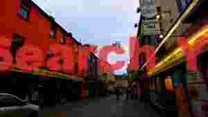 vibrant european street with suspended bicycles