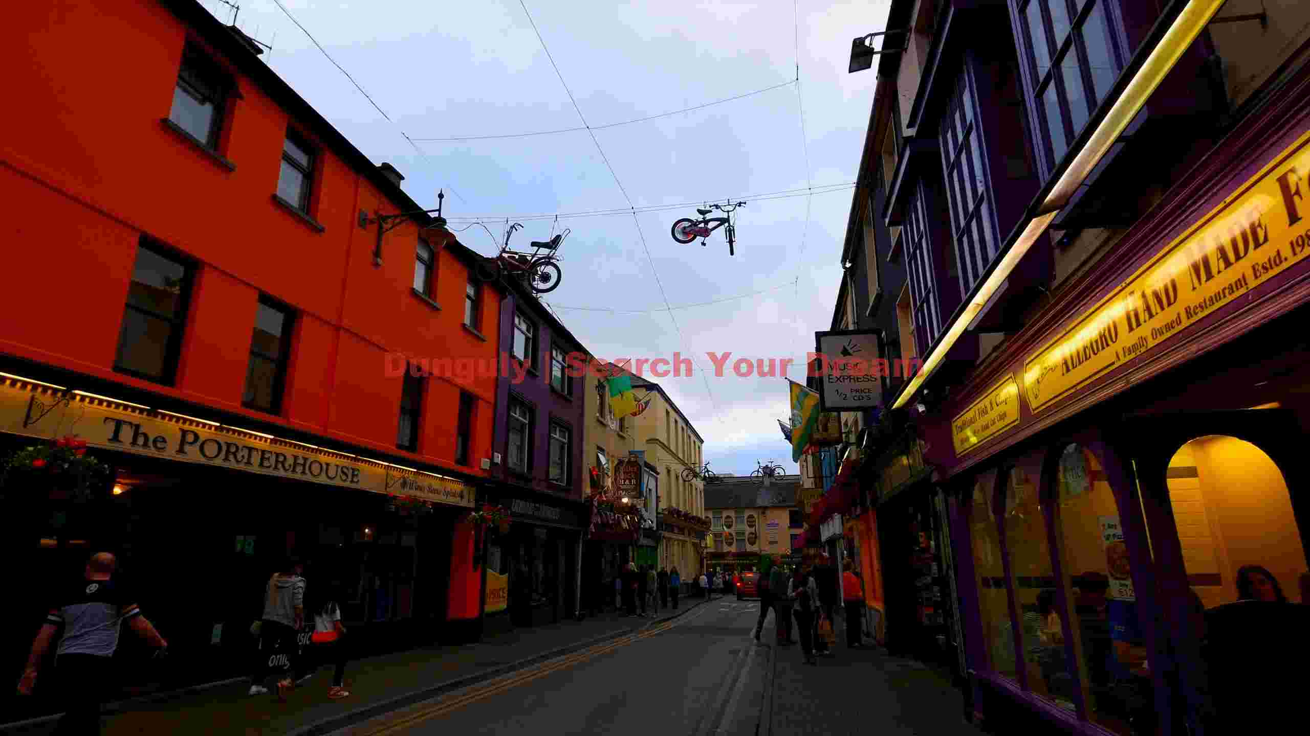 vibrant european street with whimsical bicycle art vibrant european street with whimsical bicycle art