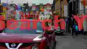vibrant irish town street with festive banners