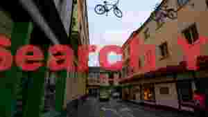 whimsical bicycles over a charming town street