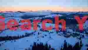 winter mountain village sunrise panorama