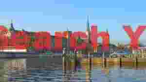 At Home zurich cityscape reflected on calm waters