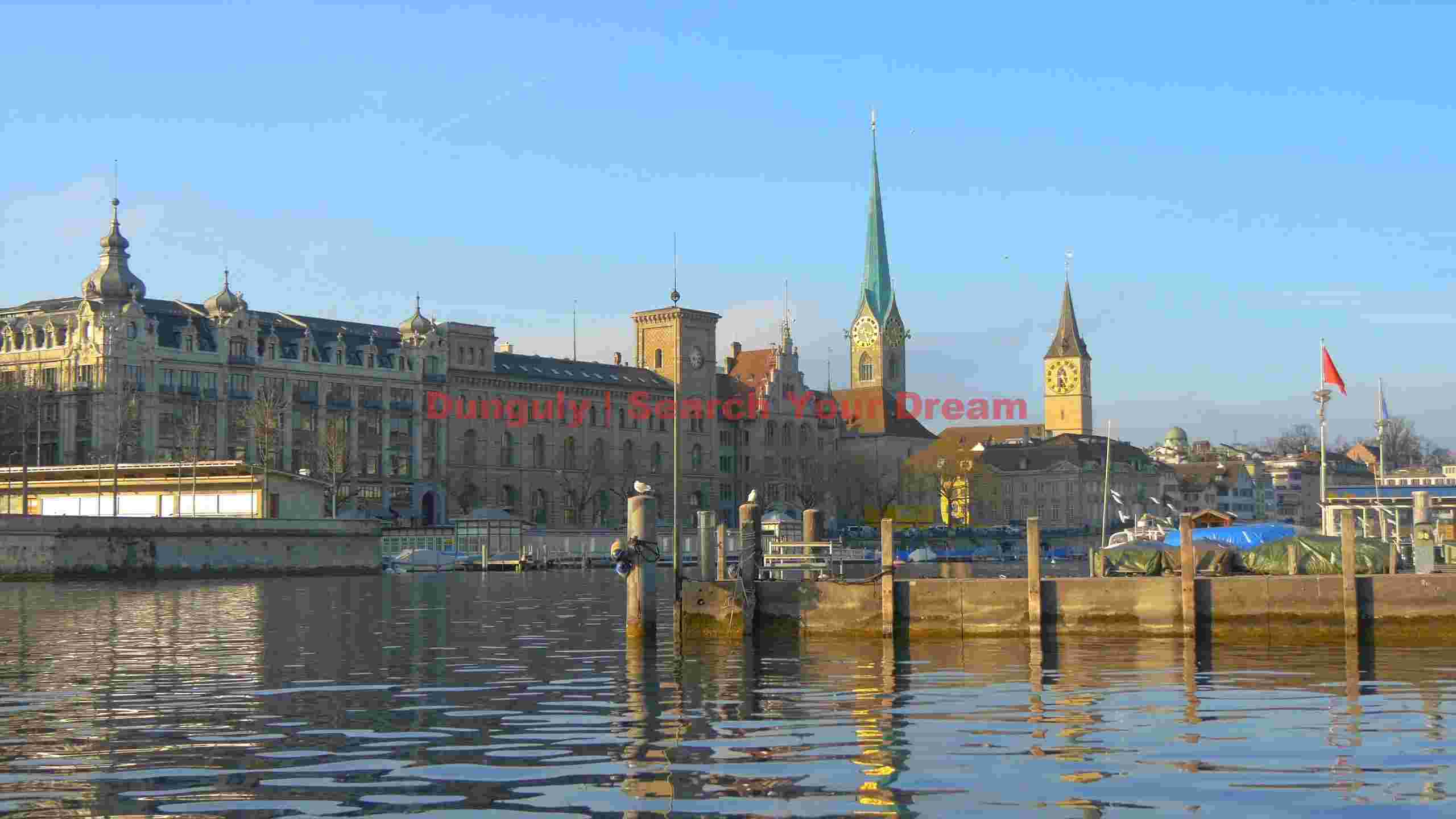 zurich cityscape reflected on calm waters zurich cityscape reflected on calm waters