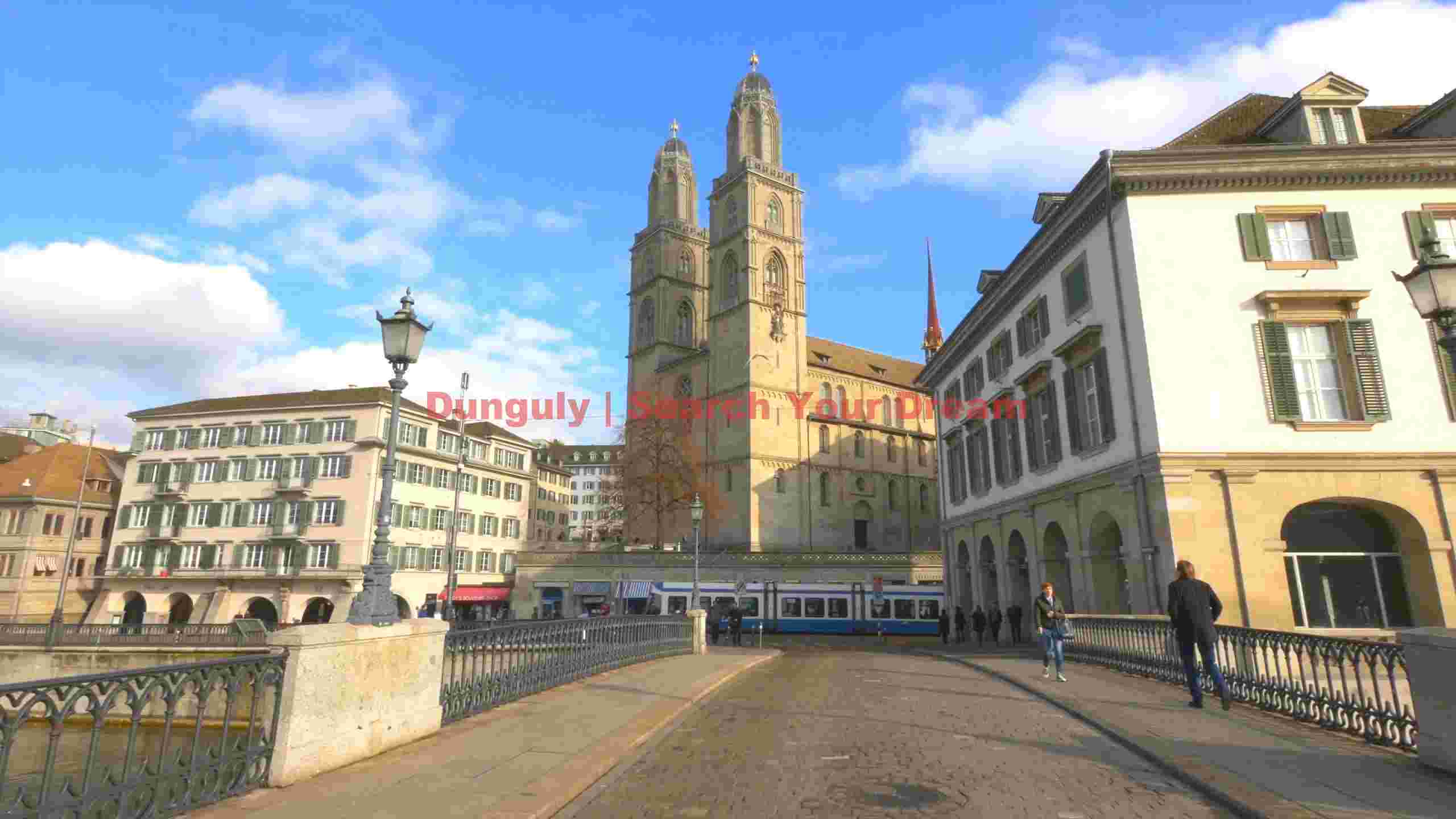 zurichs historic grossmynster and limmat river scene zurichs historic grossmynster and limmat river scene