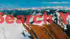 alpine grandeur snow kissed peaks and azure lake
