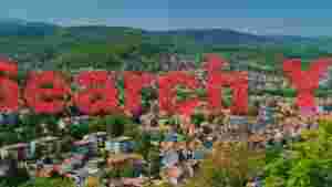 charming european village nestled in lush green hills