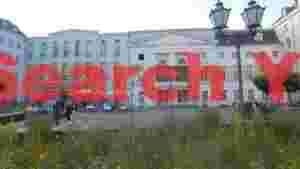At Home european city theater facade with outdoor seating