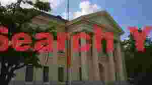 At Home grand neoclassical building with german flag