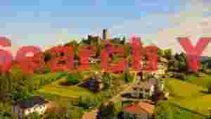 hilltop medieval castle and village panorama